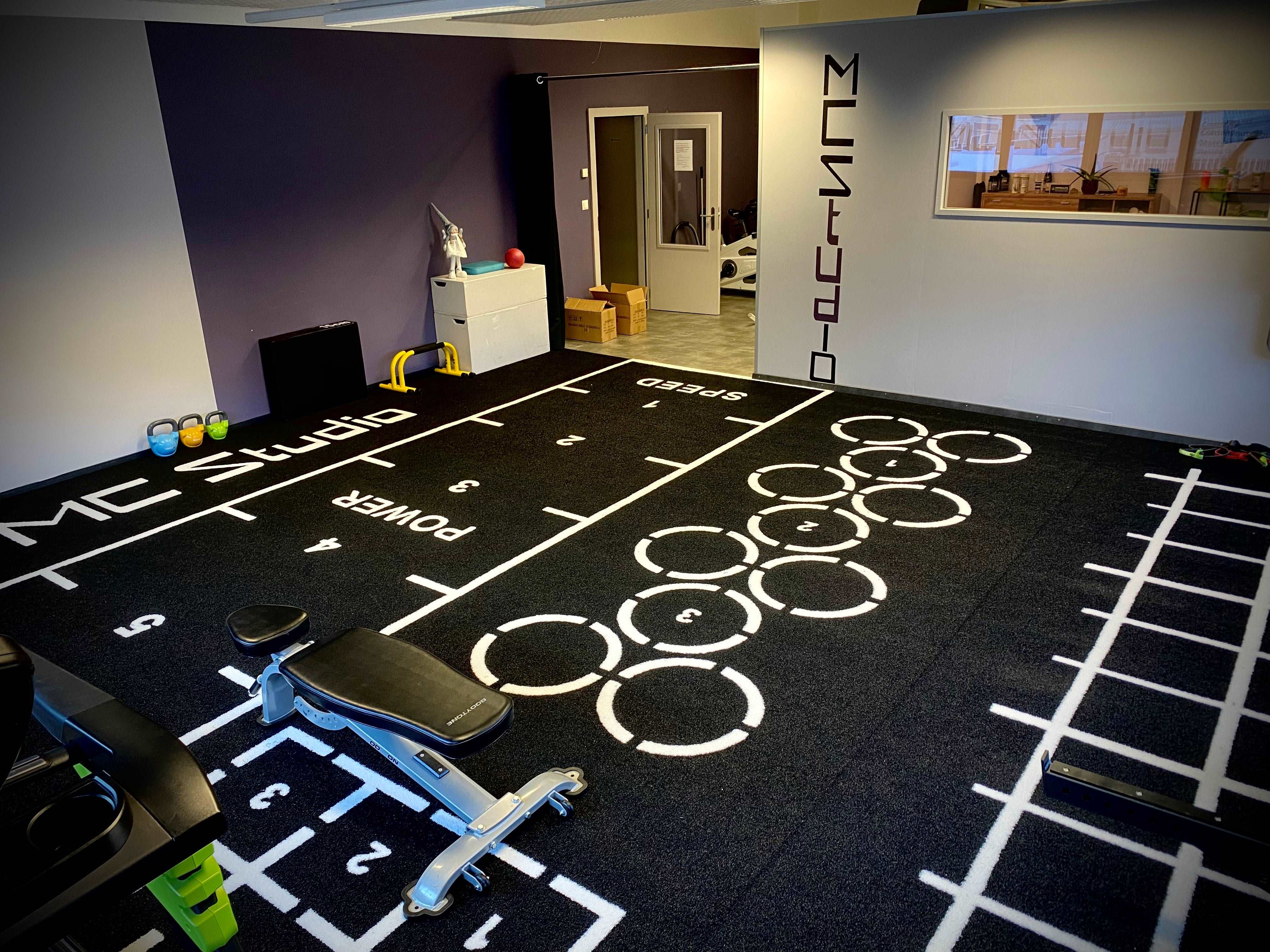 MC Coaching Martigny : Custom Gym Turf in Black with White Graphics